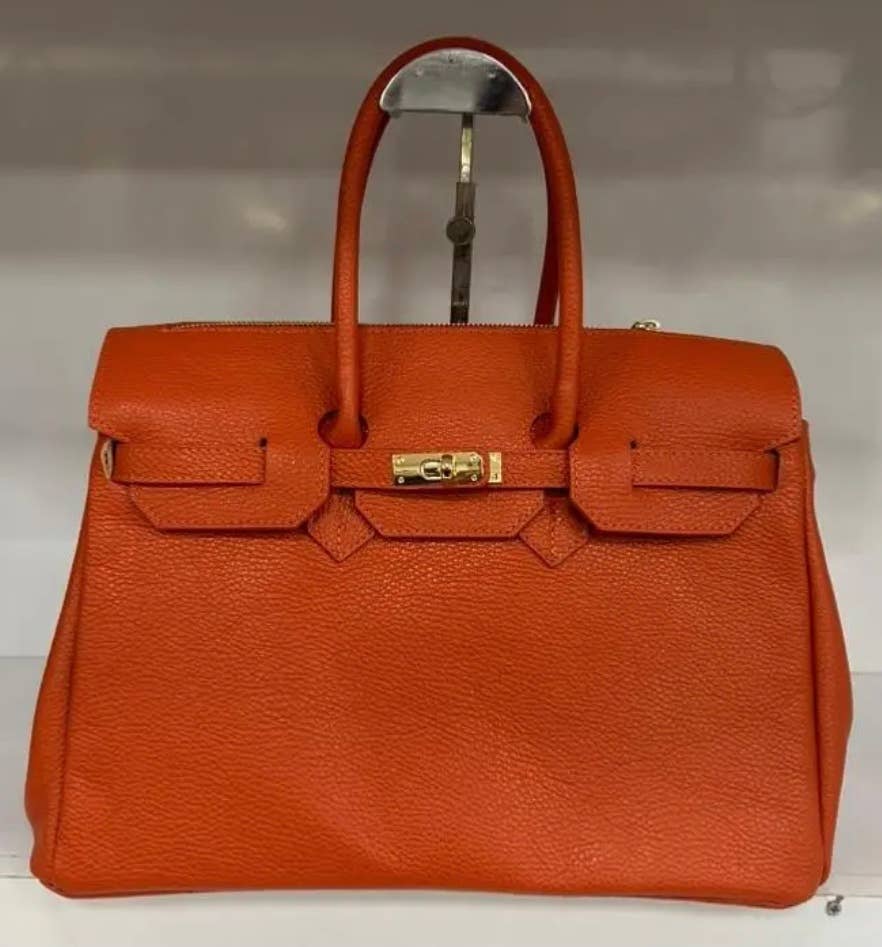SFO Leather Orange Handbag  Structured  and Lock Closure